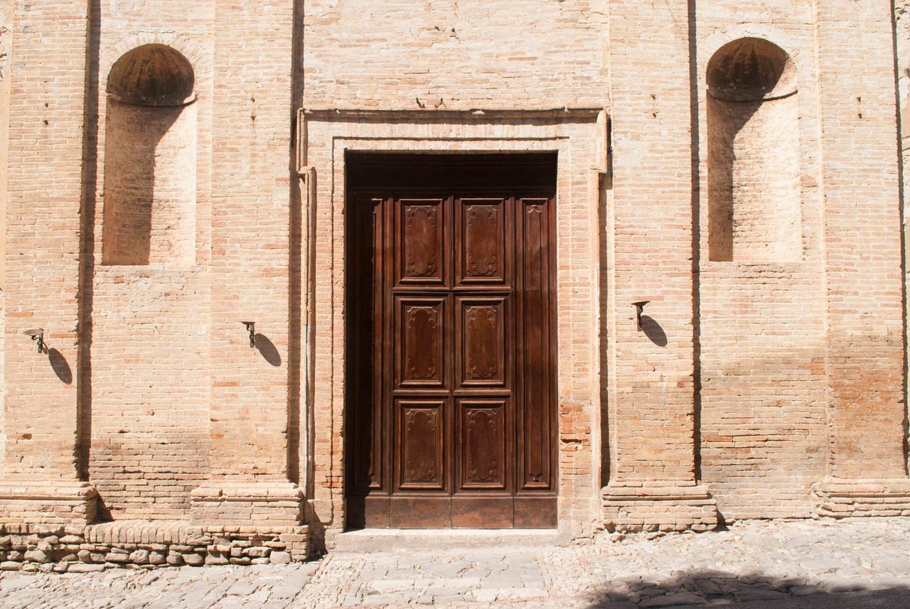 A large, spartan door in Bevagna.