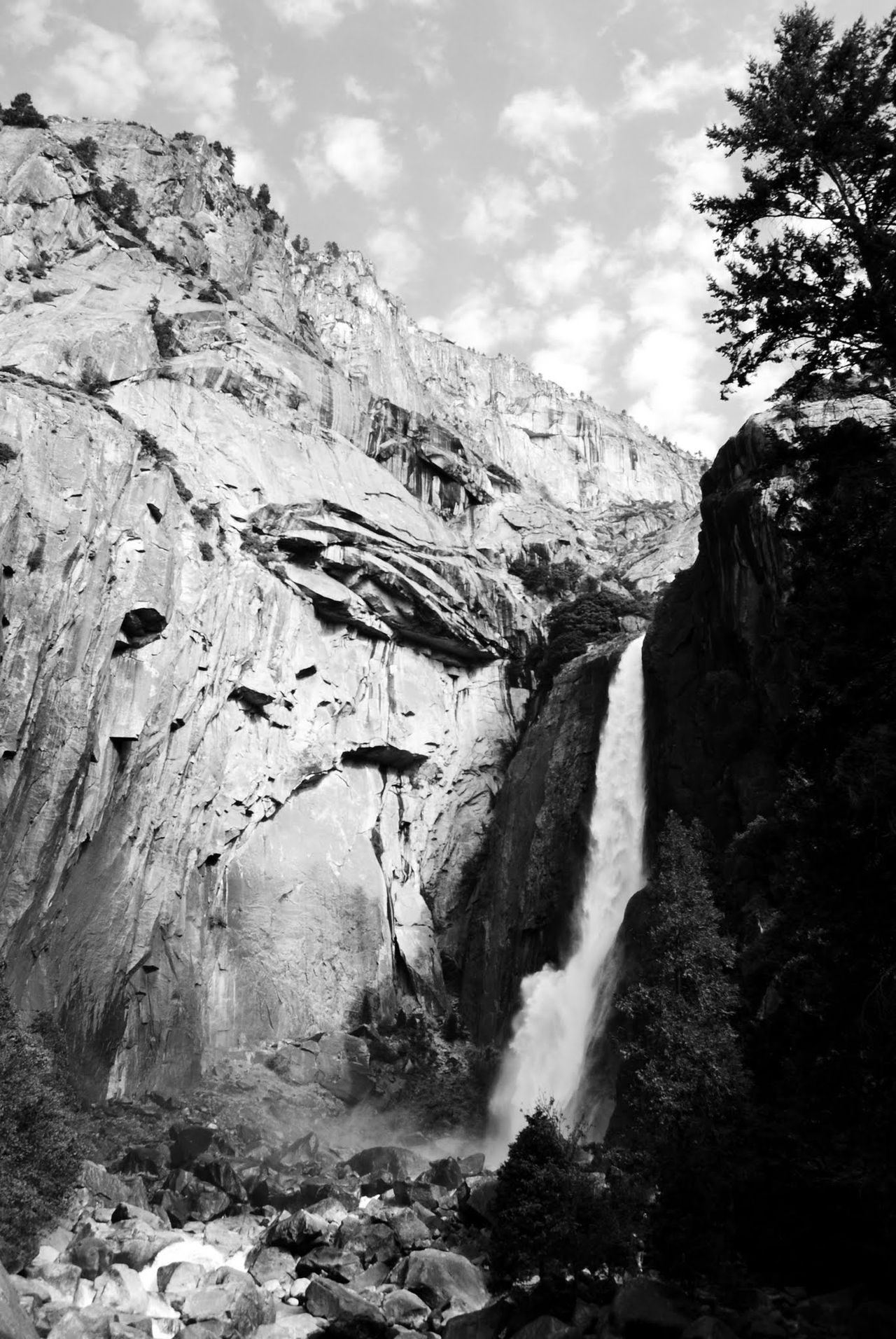 Black and white photo from the base of Yosemite Falls