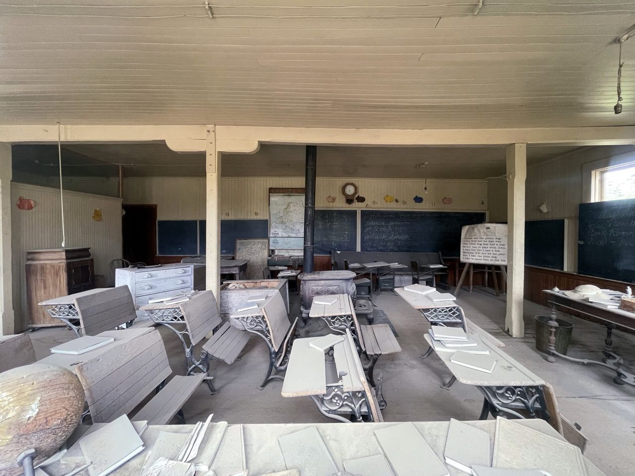 Desks in an old schoolhouse.
