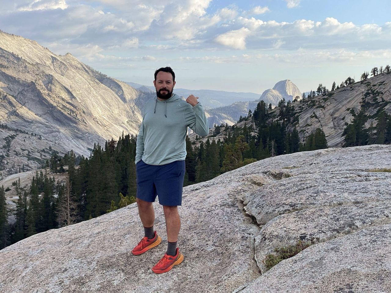 Sam Solomon pointing at Half Dome from Olmstead Point.